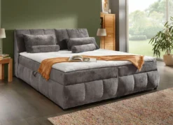 Boxspringbett mit Stauraum im Kopfteil und Bettkasten