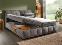 Boxspringbett mit Stauraum im Kopfteil und Bettkasten